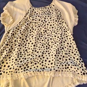 I am selling a shirt with some cow print